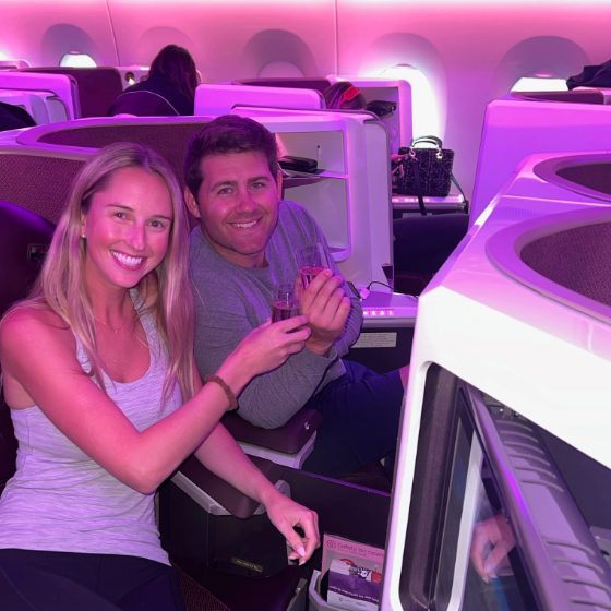 Mike and his travel companion enjoying a trip together in the Upper Class cabin